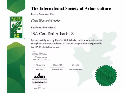 ISA Certified Arborist certificate for Chris Dunbar, demonstrating professional tree care expertise in Waukesha County.